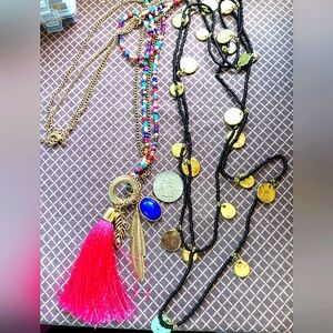 Two Boho beaded necklaces with metal feathers coin charms.